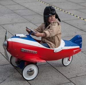 boy in toy plane